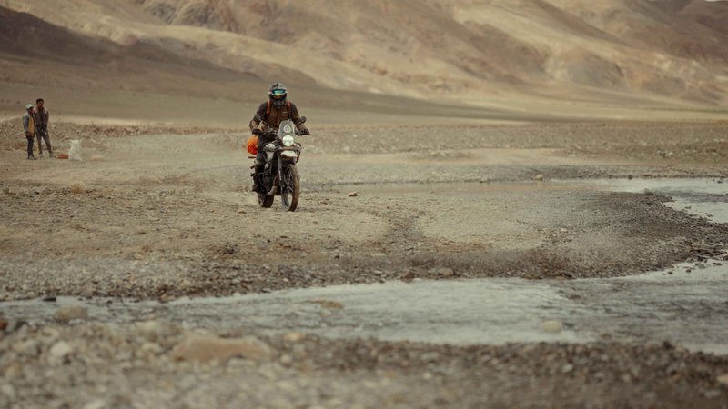 Riders enjoying an adventurous motorbike ride through Upper Mustang on Himalayan Royal Enfield motorcycles