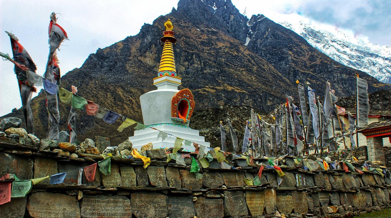 "Mu Gompa Monastery perched on a hillside in Tsum Valley, showcasing traditional Tibetan architecture and spiritual heritage."