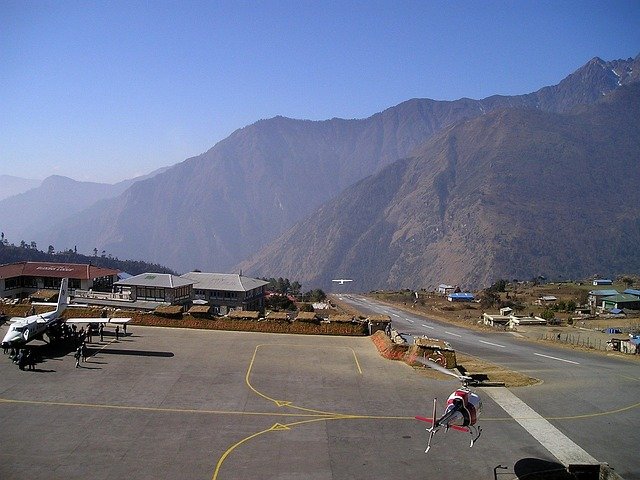 Lukla Airport runway in the Himalayas, gateway to Everest and Pikey Peak trekking routes in Nepal.