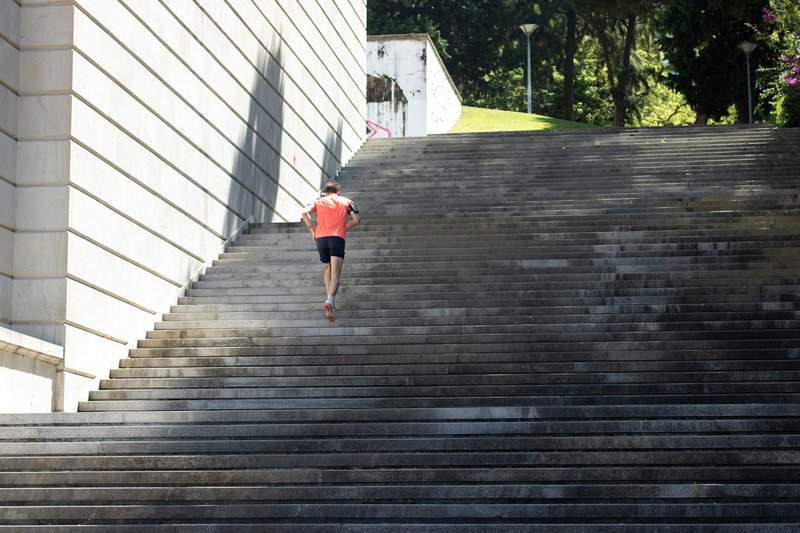 A-man-practicing-stair-step-for-manaslu-circuit-trek