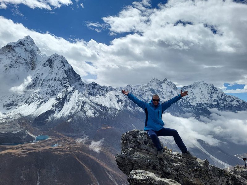 Adventurous trekkers reaching Everest Base Camp on a HimalayanHero tour
